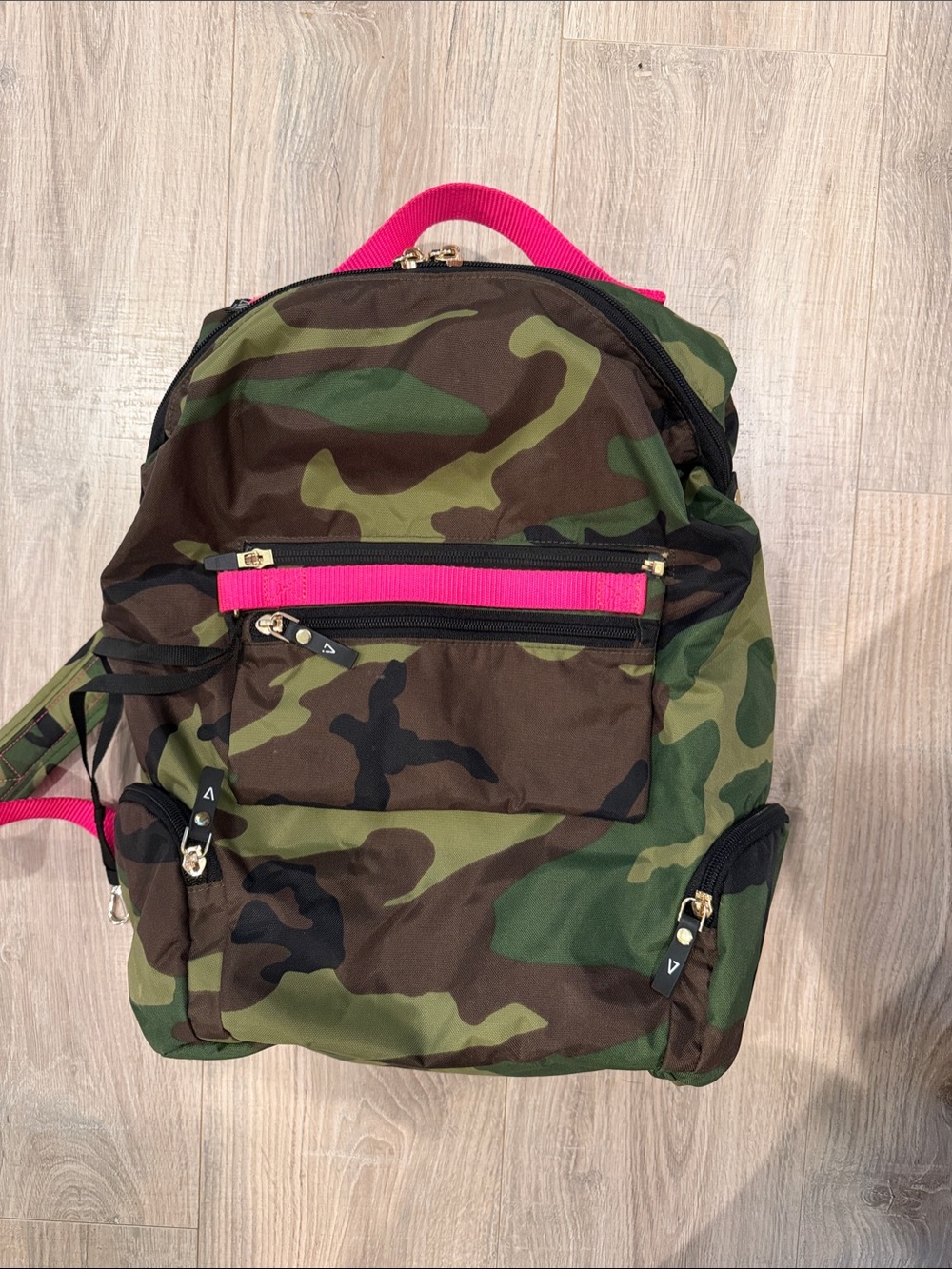 ANDI camo and hot pink backpack